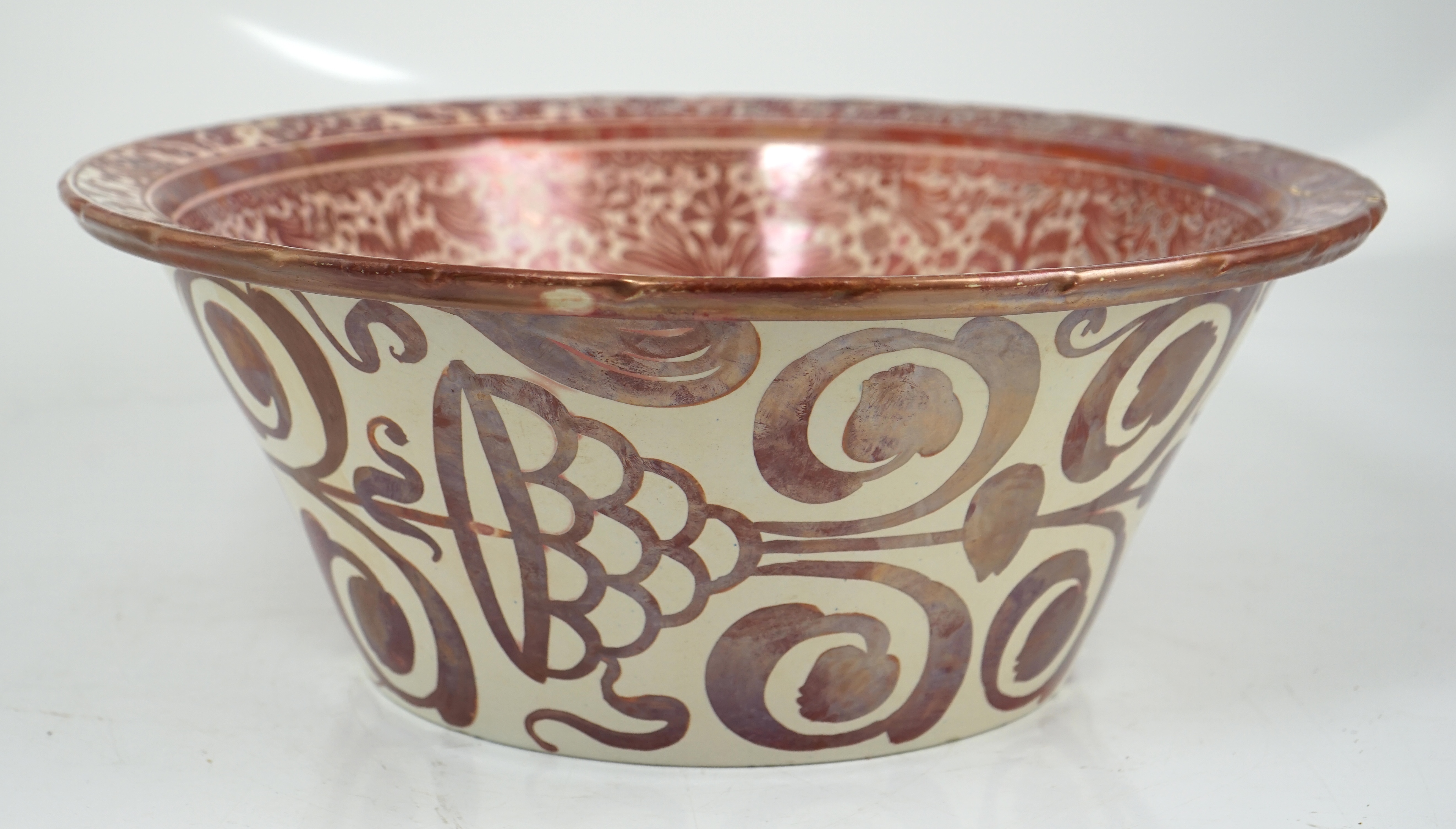 Ulisse Cantagalli, a large Hispano-Moresque style ruby-copper lustre basin, c.1900, some restoration